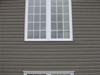 Fen&ecirc;tres &agrave; battant en PVC avec carrelage et fen&ecirc;tres coulissantes Egress en PVC